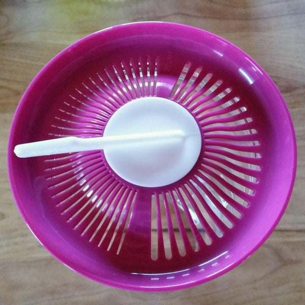 Racloir du kéfirko pour aider à filtrer les grains