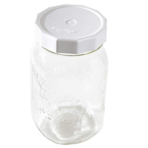 Couvercle en plastique sur pot Mason